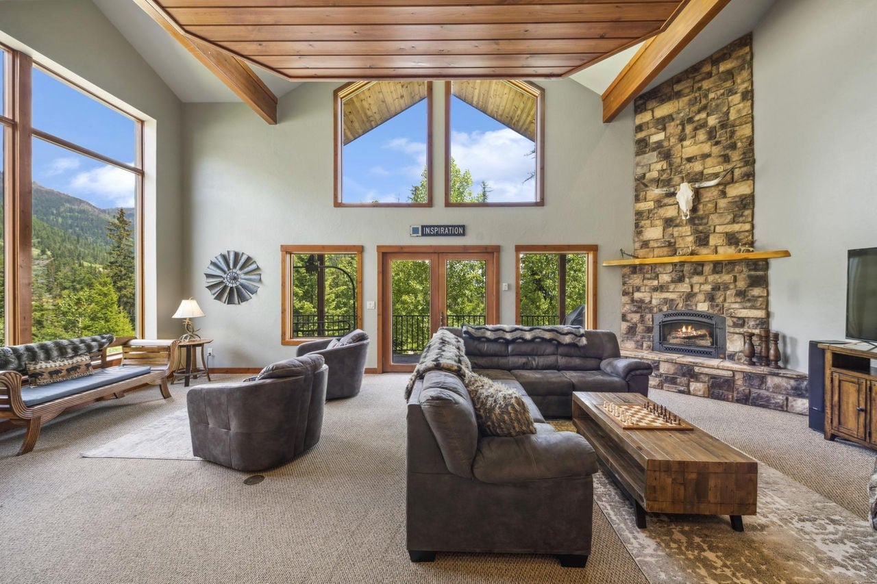 Chair View Challet living room with windows and view 